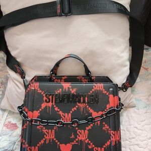 Steve Madden Black and Red Graphic Messenger Bag